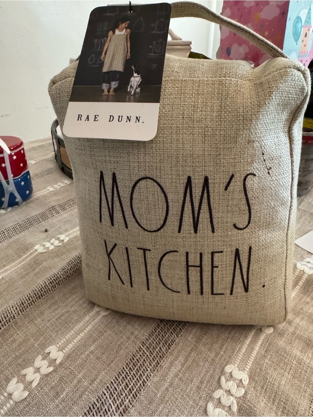 Rae Dunn Cream Fabric Doorstop with Black Lettering - "MOM'S KITCHEN"